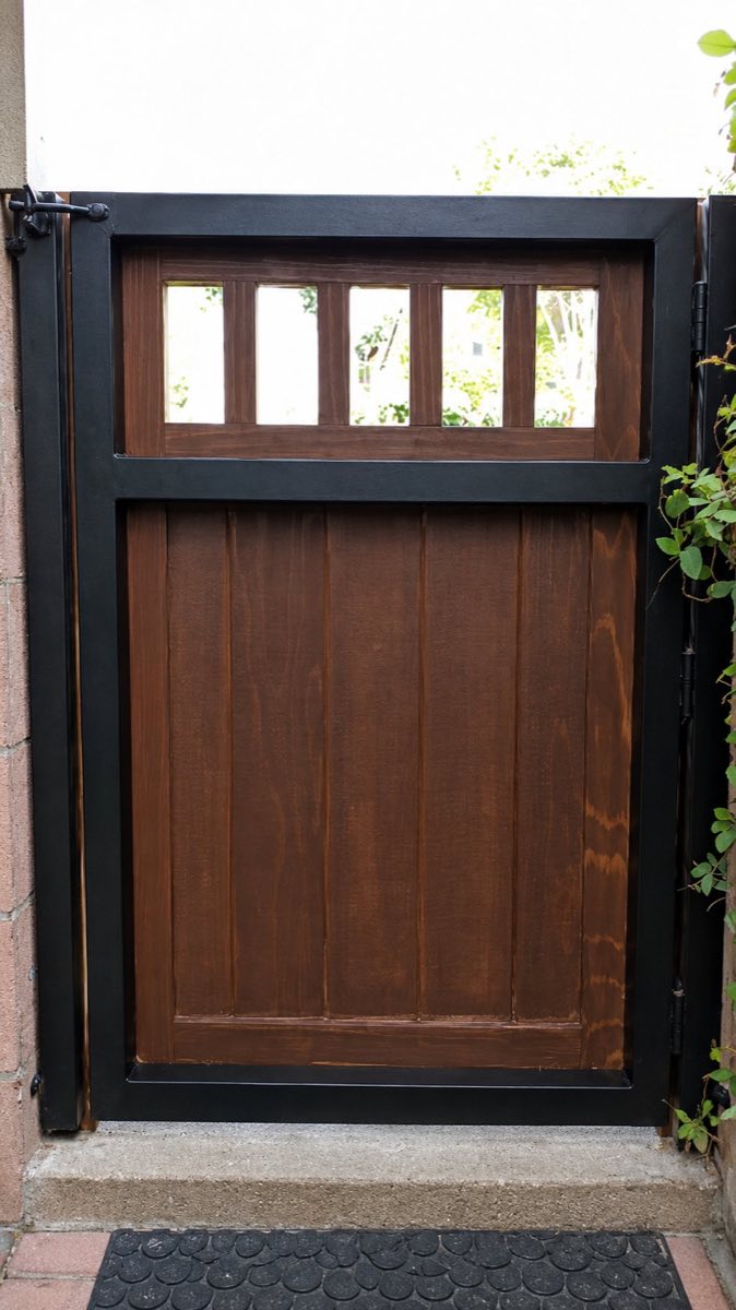 Custom wood gate installation in Broward