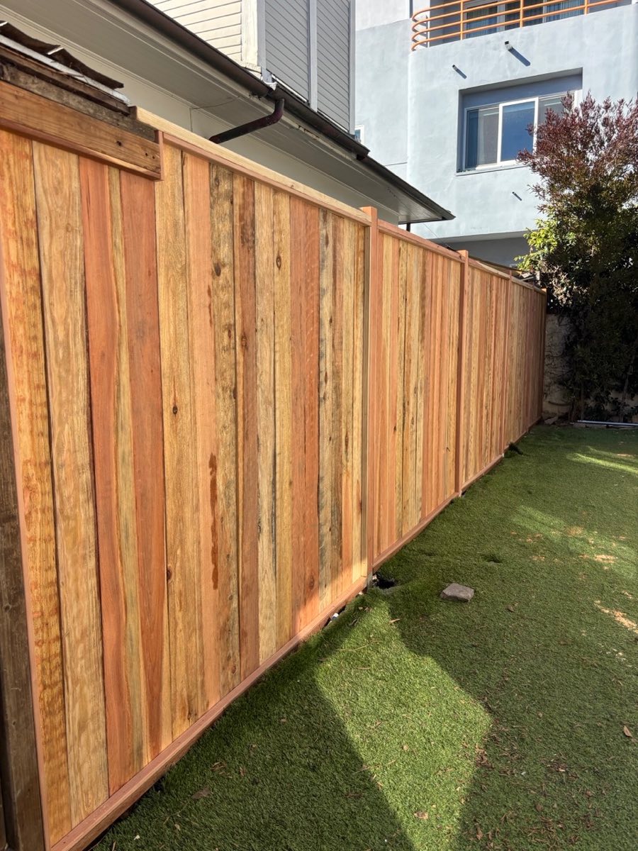 Cedar fence post-refresh natural finish