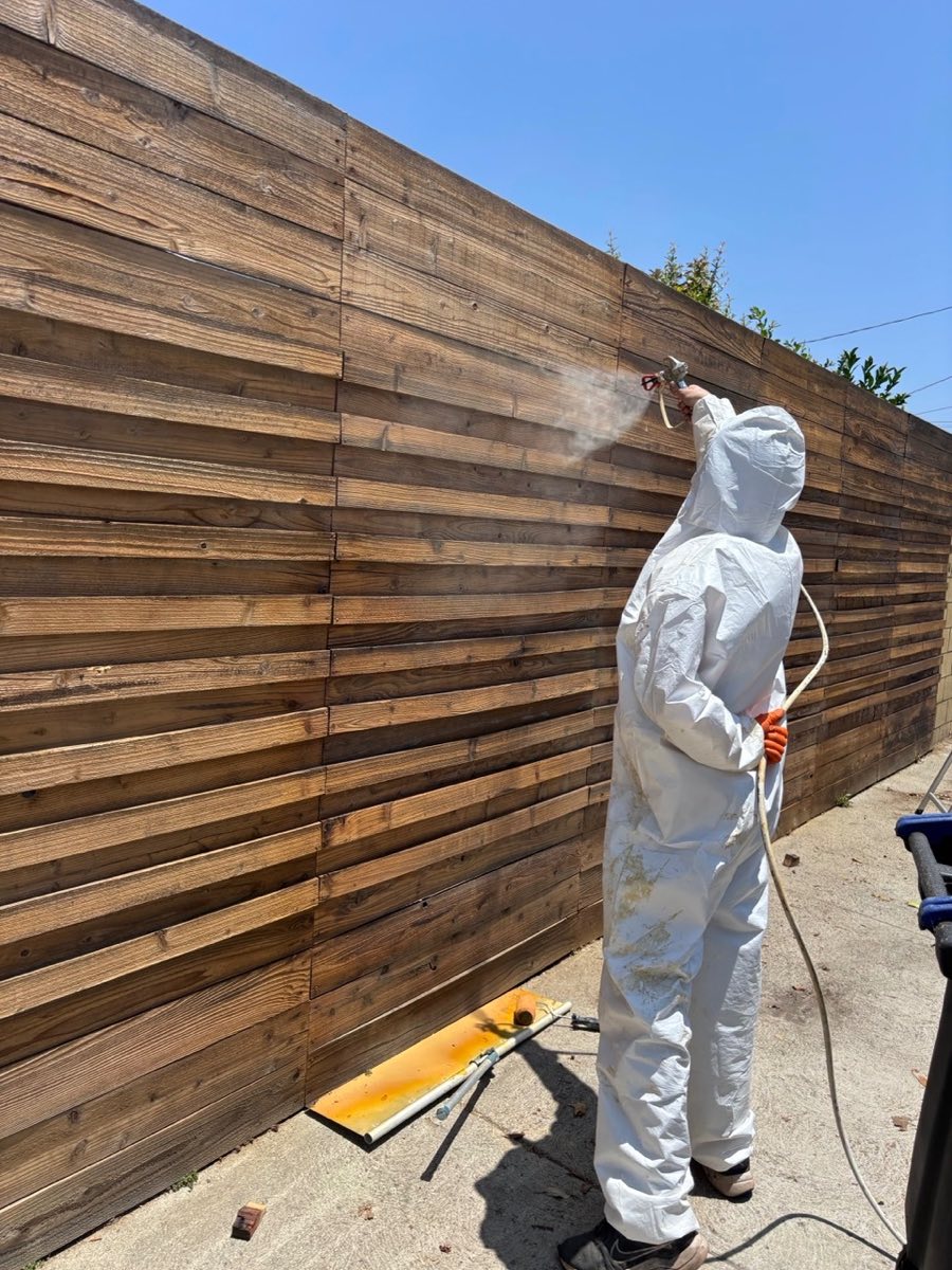 Side-yard fence repainted