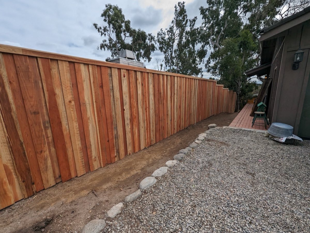 Sealed wood fence under Florida sun