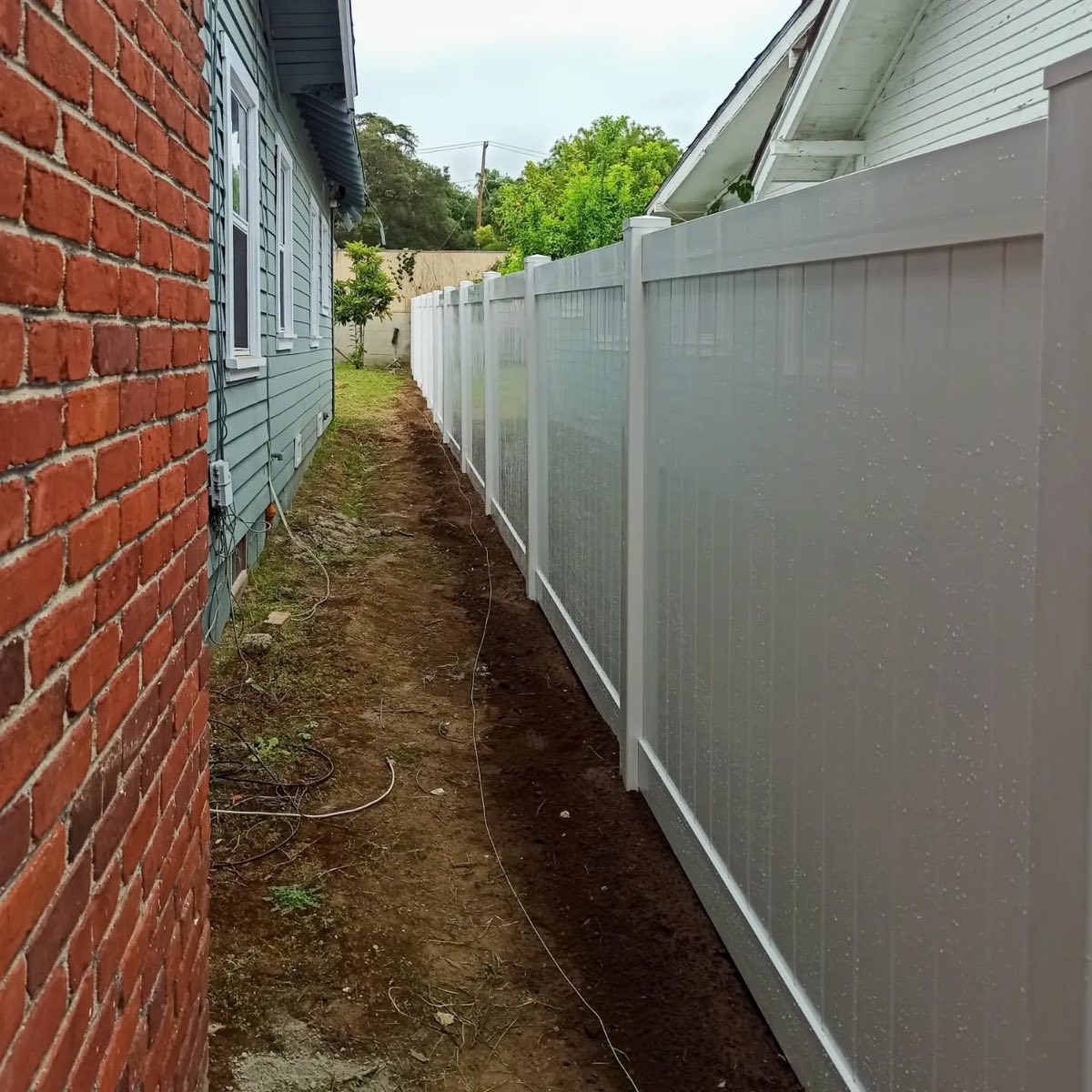 Stained wood fence after job