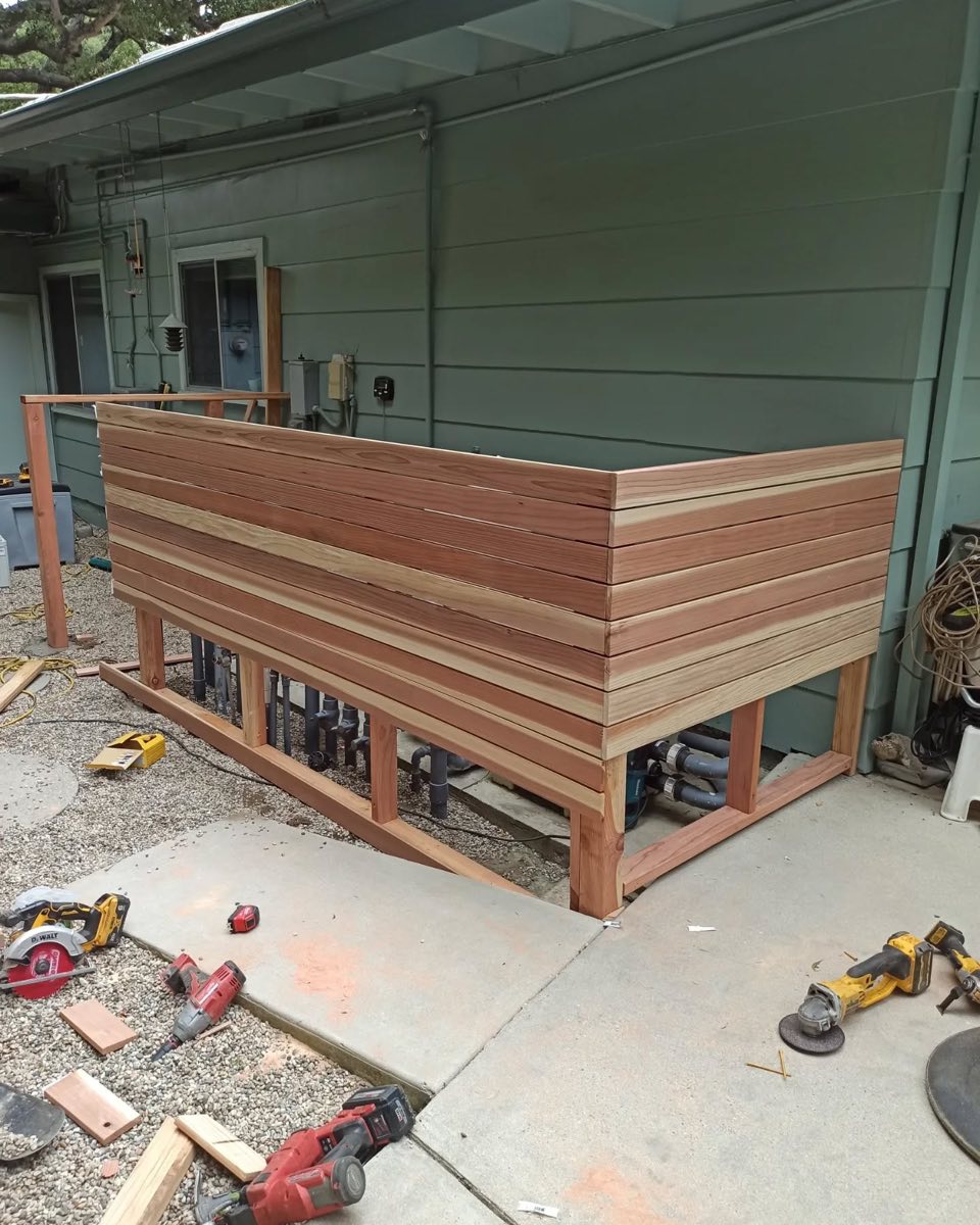 Refreshed wood fence in evening light