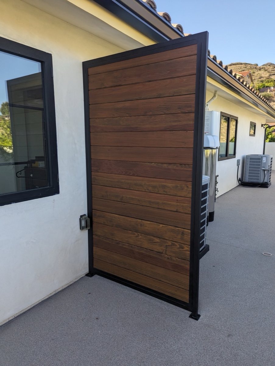 Wood fence after fresh stain
