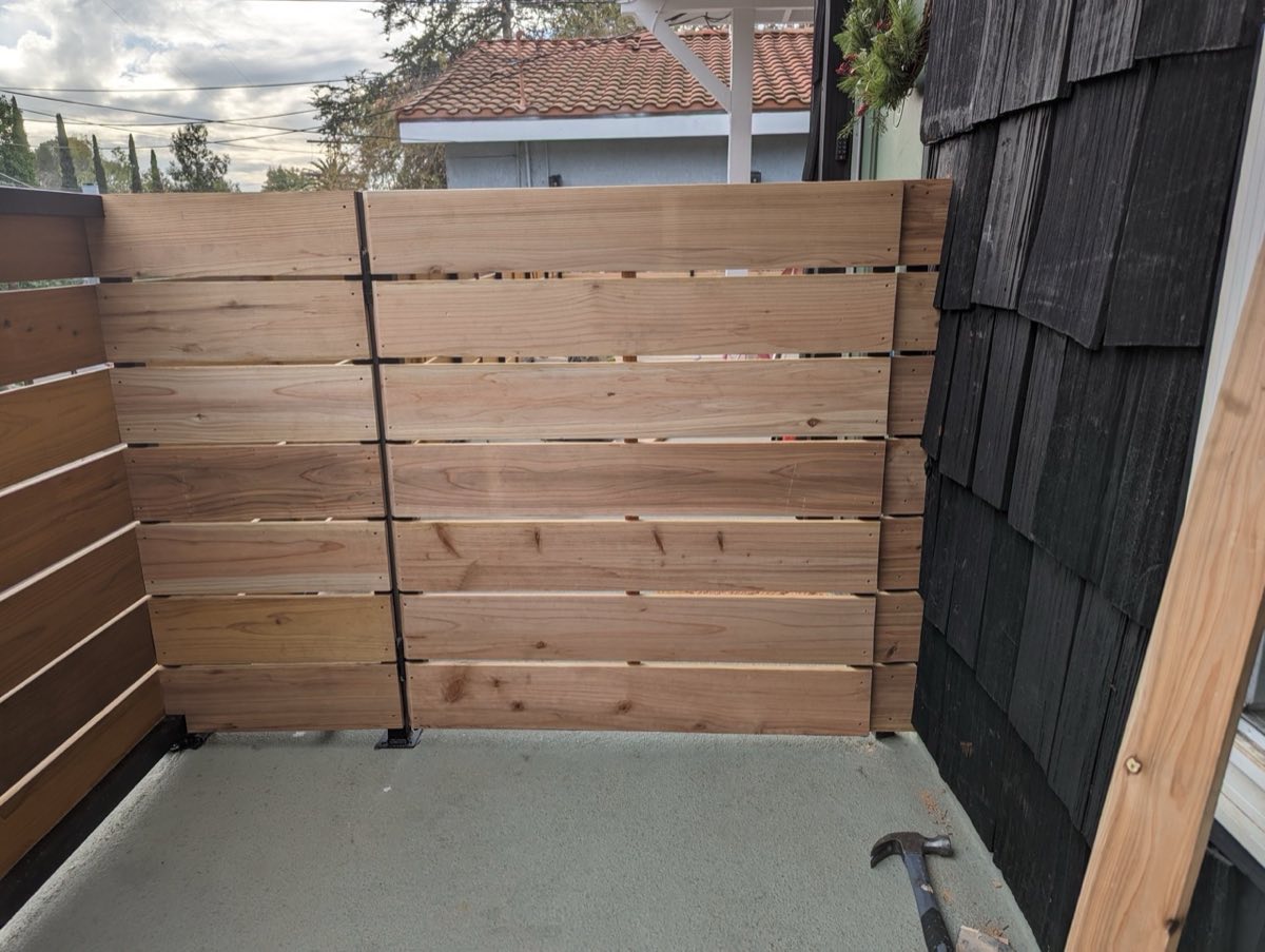 Wood fence finished, full view